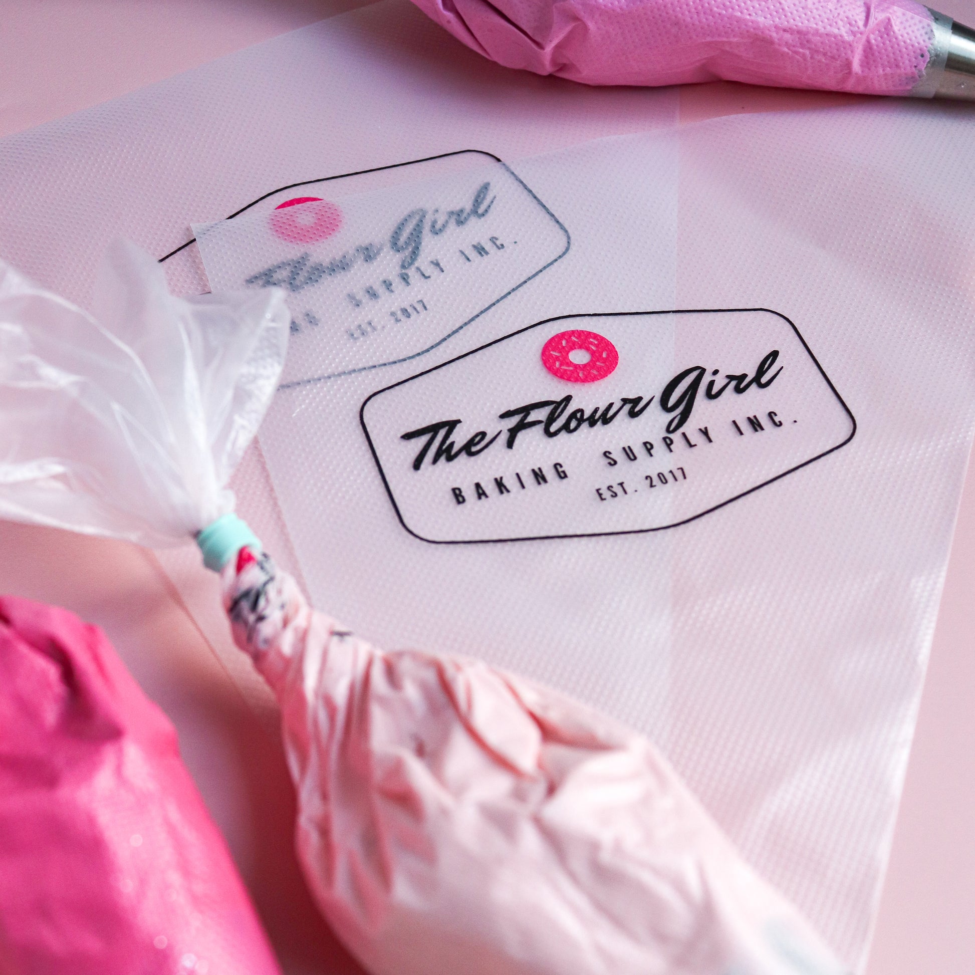 Baking supplies with 'The Flour Girl' branding on a white surface.